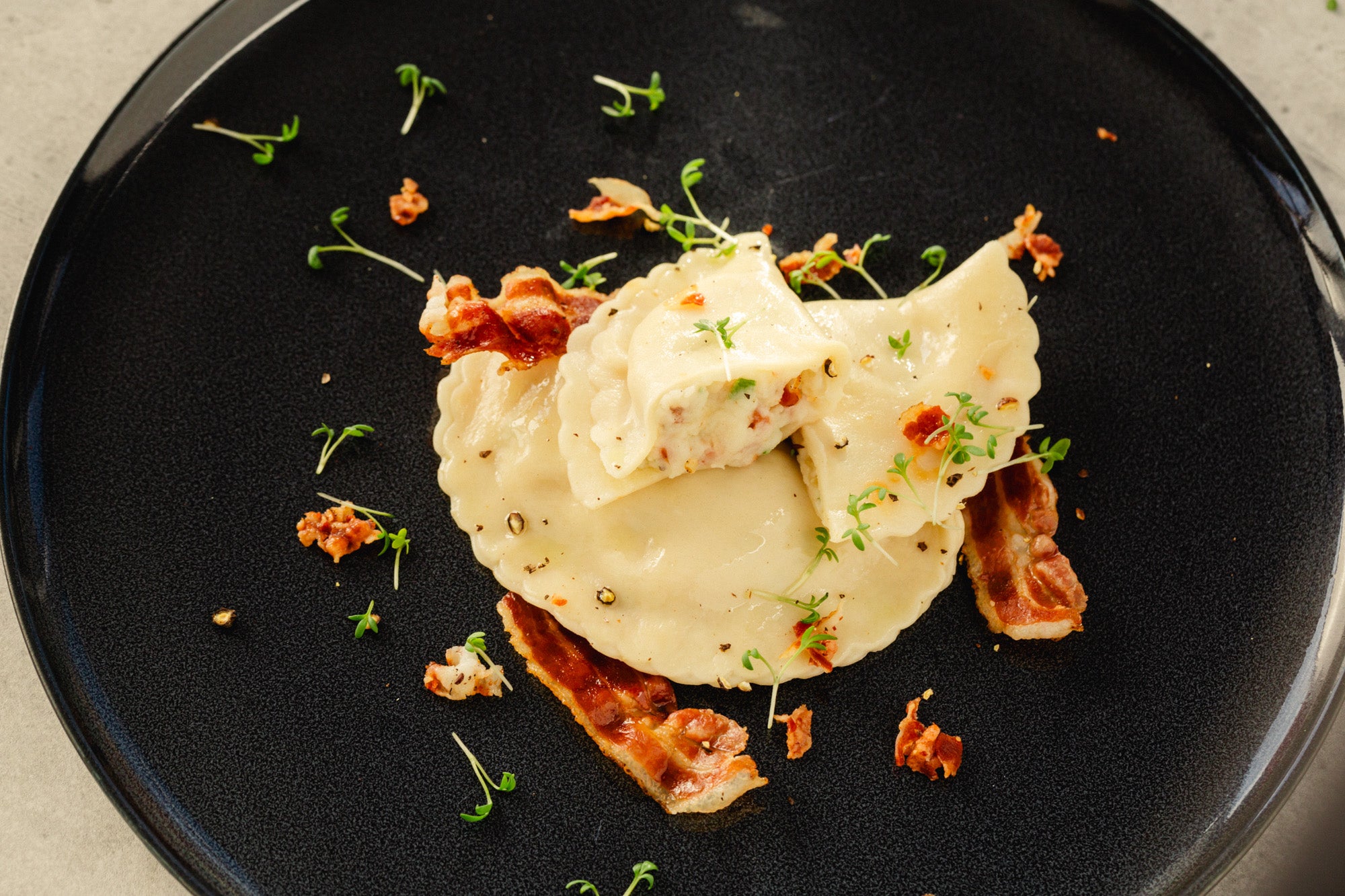 Schlutzkrapfen mit Speckfülle